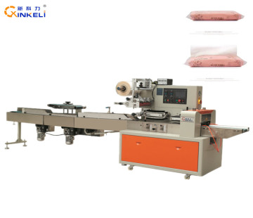 Automatic tissue paper packaging machine